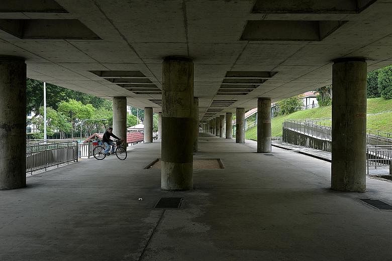 The space under this stretch of MRT tracks - between Yio Chu Kang Station and Bishan-Ang Mo Kio Park - is set to be incorporated into an upcoming 2.6km-long cycling and walking corridor, part of a 16km network in Ang Mo Kio.
