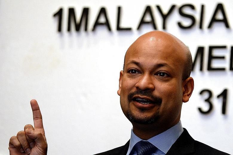 The Bandar Malaysia site now houses the Sungai Besi air force base (left) and other government facilities. 1MDB's Mr Arul Kanda Kandasamy (above) sidestepped a question on whether IWH-CREC had overpaid for the stake.