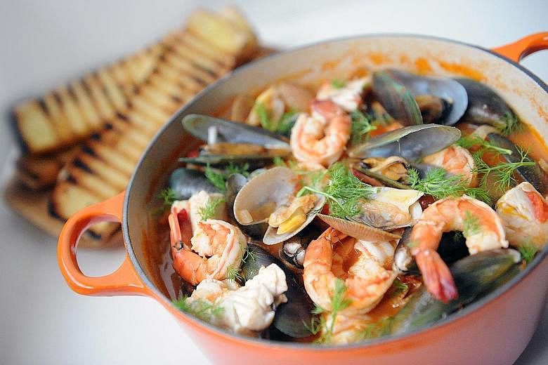 Large tiger prawns and firm seabass are a must in this seafood stew.