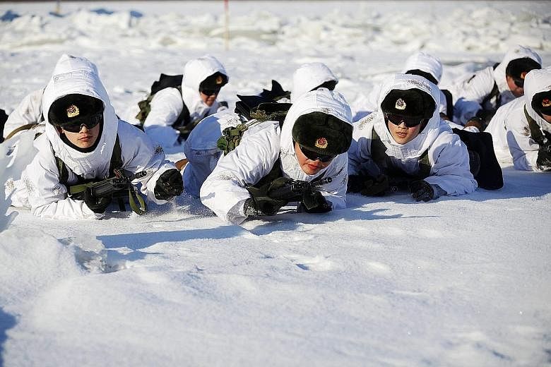Soldiers during an exercise in Heihe in Heilongjiang province. Some observers say the military restructuring is aimed at modernising the PLA and improving its efficiency in various battle scenarios.