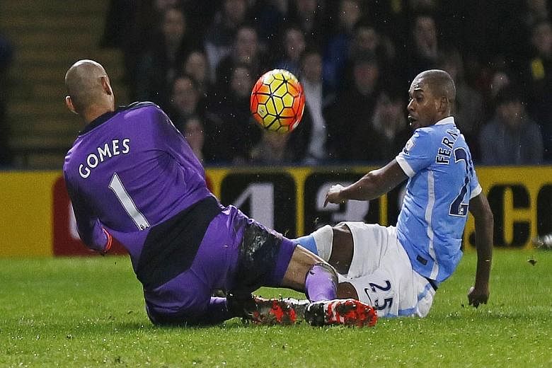 Fernandinho, who has played the most number of minutes for Manchester City so far this season, challenging Watford goalkeeper Heurelho Gomes in City's 2-1 league win last Saturday.