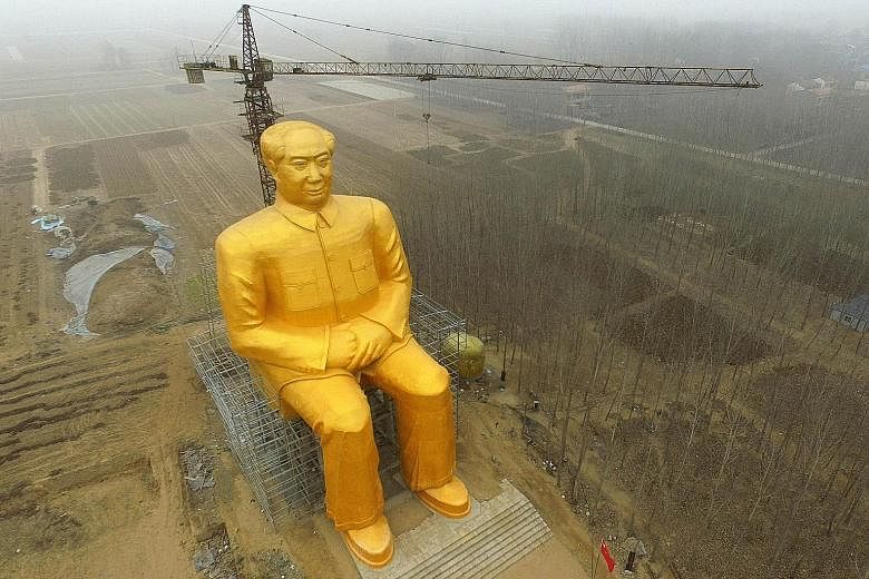 A huge gold-painted statue of former Chinese leader Mao Zedong is being erected in Tongxu county in China's central Henan province. Construction of the 36.6m-high statue has been going on for nine months and is funded by local entrepreneurs.