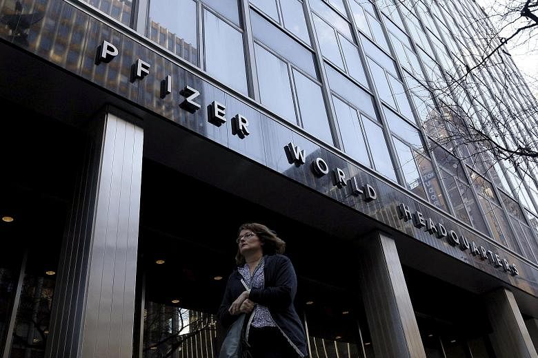 The Pfizer World Headquarters building in New York. The healthcare industry defied belief in 2015 with US$605 billion (S$867.7 billion) of takeovers. Among the mega deals, Pfizer agreed to buy Allergan, itself a prolific merger partner, for US$160 bi