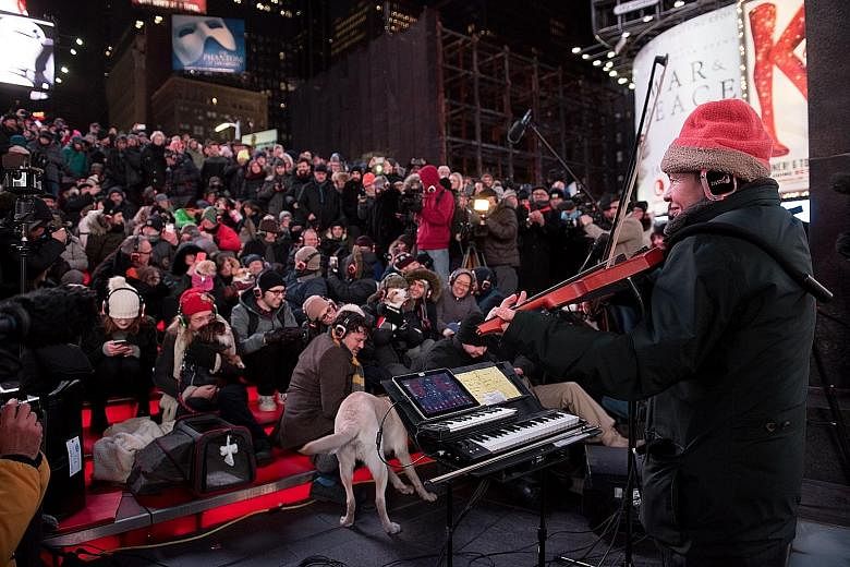 The concert was performed by Laurie Anderson (right) in the open where the temperature was minus 10 deg C.