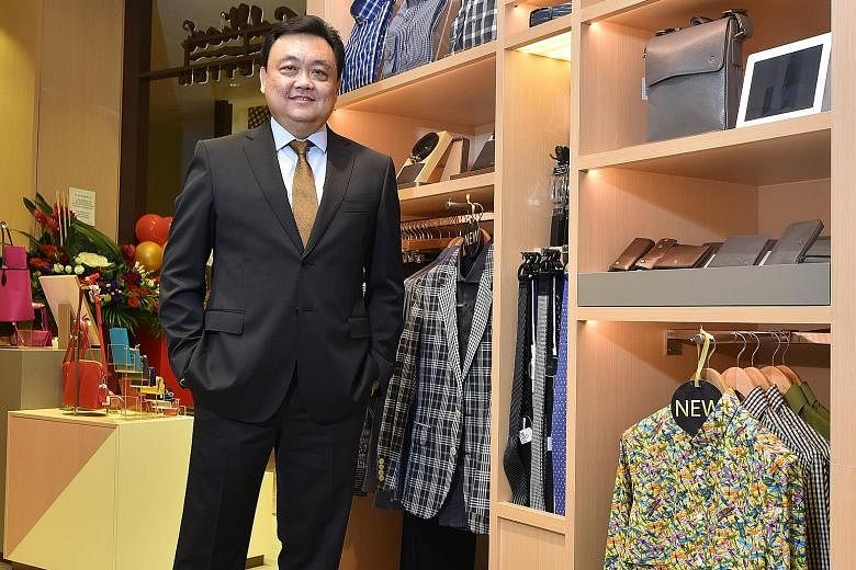 Goldlion Singapore chief executive officer Benjamin Lee (above) at the brand's concept store at Capitol Piazza.