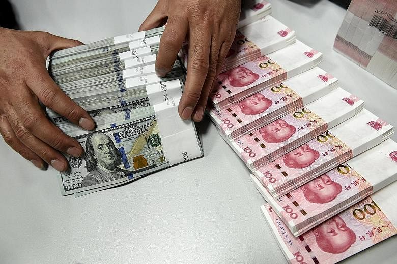 Analysts said the Chinese central bank's move could mean the yuan's value will now be set against a basket of currencies instead of just the United States dollar.