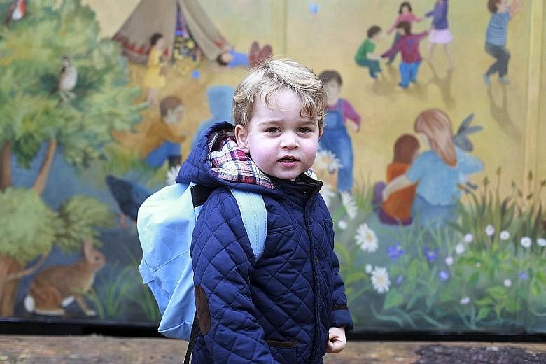Britain's Prince George arriving for his first day at the Westacre Montessori School Nursery, after being dropped off by his mother Catherine, Duchess of Cambridge, and father Prince William. The two-year-old prince will attend the nursery in Norfolk