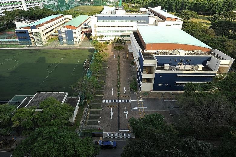 The carpark in First Toa Payoh Secondary School. The MOE is reviewing carpark charges for schools "in accordance with civil service guidelines".