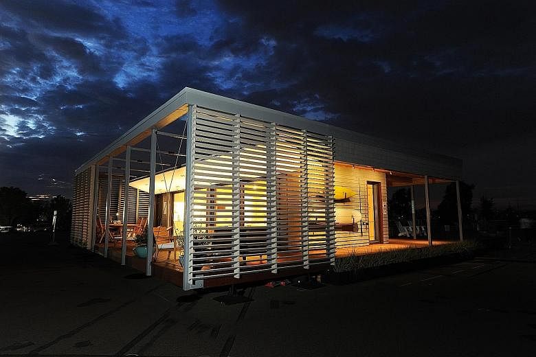 The winning solar home design by the Stevens Institute of Technology submitted for the US Department of Energy's Solar Decathlon. An undated handout photo of Google's self-driving car in Mountain View, California. Toyota's Mirai fuel-cell car - which