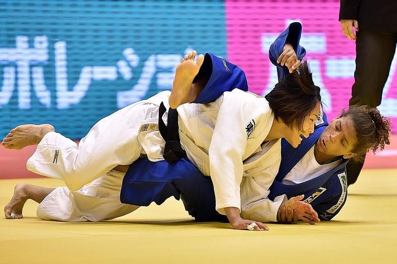 Rafaela Silva tackling Japan's Olympic and double world champion Kaori Matsumoto in the second round of the Grand Slam Tokyo last month. Both did not win a medal.