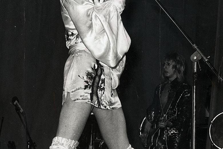 Bowie in concert in 1975 (above), when he was known as the Thin White Duke.
