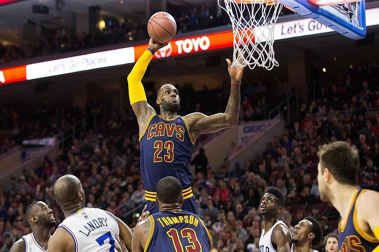 Cleveland Cavaliers forward LeBron James dunking against the Philadelphia 76ers during the first quarter at Wells Fargo Centre. The Cavaliers won 95-85.