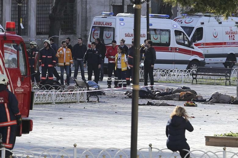 Rescue teams gather at the scene after an explosion in central Istanbul, Turkey on Jan 12, 2016. 