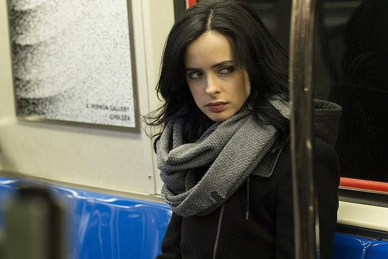 Krysten Ritter as private eye Jessica Jones who is leery of the world.