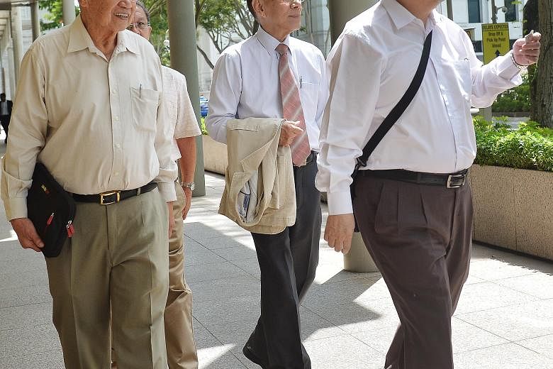 Hainan Tan Clan Association former deputy president Tan Khin Pang (from far left) and former presidents Tan Han Kwang and Tan Boon Hai are being sued by ex-MP Sin Boon Ann over the allegations, which were the result of events leading up to the December 20