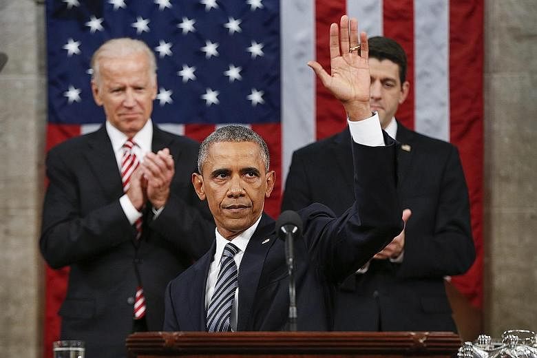 US President Barack Obama concluding his State of the Union address on Tuesday. Behind him were Vice-President Joe Biden (left) and House Speaker Paul Ryan. In his most forceful call for the US to fix its politics, Mr Obama said "it's not enough to j