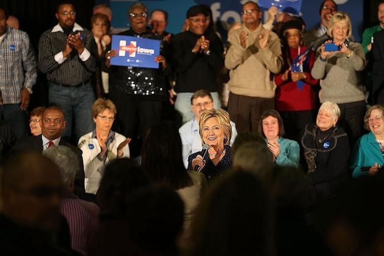 Mrs Hillary Clinton during a campaign stop in Waterloo, Iowa, this week. Her diminishing lead over Vermont senator Bernie Sanders among Democratic primary voters reveals a sharp generational divide within the party, with voters under 45 strongly favo