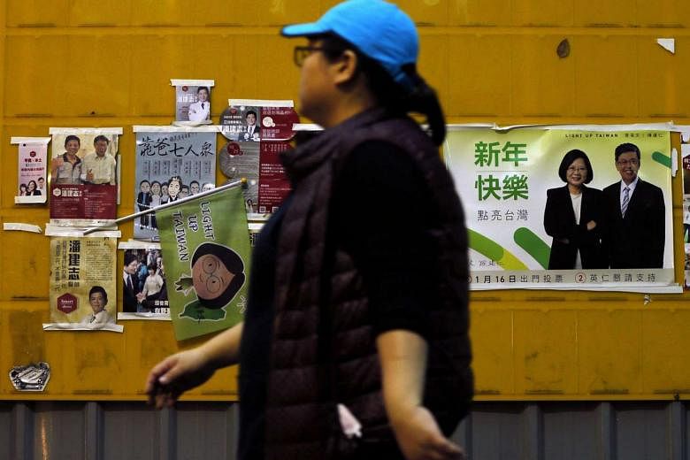 Campaign posters and banners displayed in public areas ahead of the presidential election in Taipei. Taiwan will hold its presidential election on Saturday.