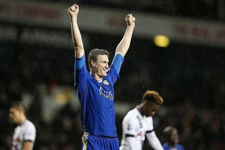 Leicester City's Robert Huth celebrating after their match against Tottenham, as his late goal proved to be the winner. His strike ended a 374-minute goal drought for the Foxes in the Premier League.