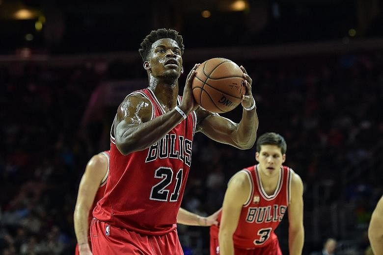 Chicago Bulls guard Jimmy Butler scored a career-high 53 points, 10 rebounds and six assists in the 115-111 overtime victory over Philadelphia.