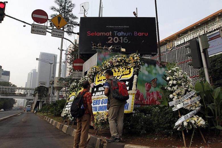 Floral tributes at the bomb blast site in J1 Thamrin in Jakarta. The number of Indonesian fighters estimated to have joined ISIS is between 500 and 700, which seems a lot as a raw number, says the writer, but is small relative to the Indonesian Musli