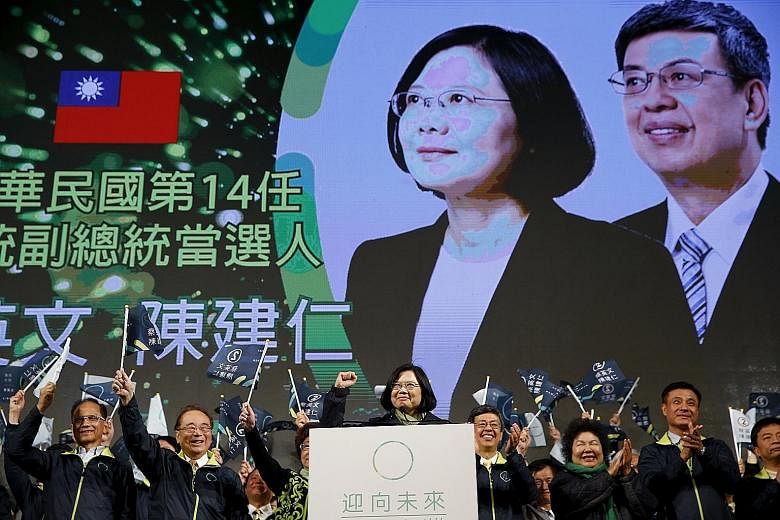 DPP presidential candidate Tsai celebrating Saturday's election victory at the party's headquarters in Taipei. A political limbo ensues as she will be sworn into office only on May 20.
