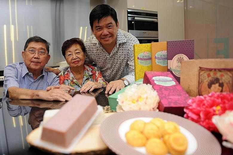 Former Bakerzin founder Daniel Tay (right) with his parents, Mr Tay Yam Choong and Madam Lim Ai Kiang, and some of the confections that are being sold at online bakery Old Seng Choong.