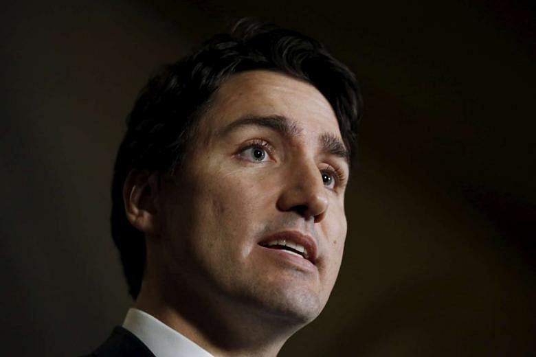 PM Trudeau says weak Canadian dollar, oil hurting large parts of ...