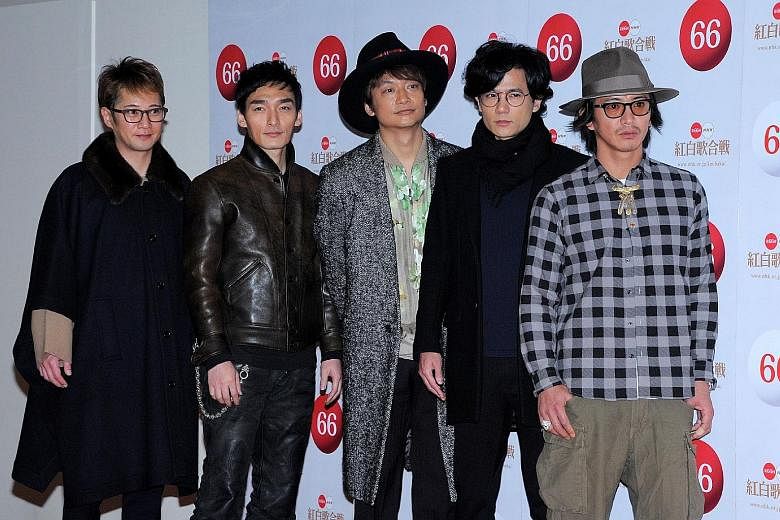 Members of Smap (from left) Masahiro Nakai, Tsuyoshi Kusanagi, Shingo Katori, Goro Inagaki and Takuya Kimura have announced that they are staying together.