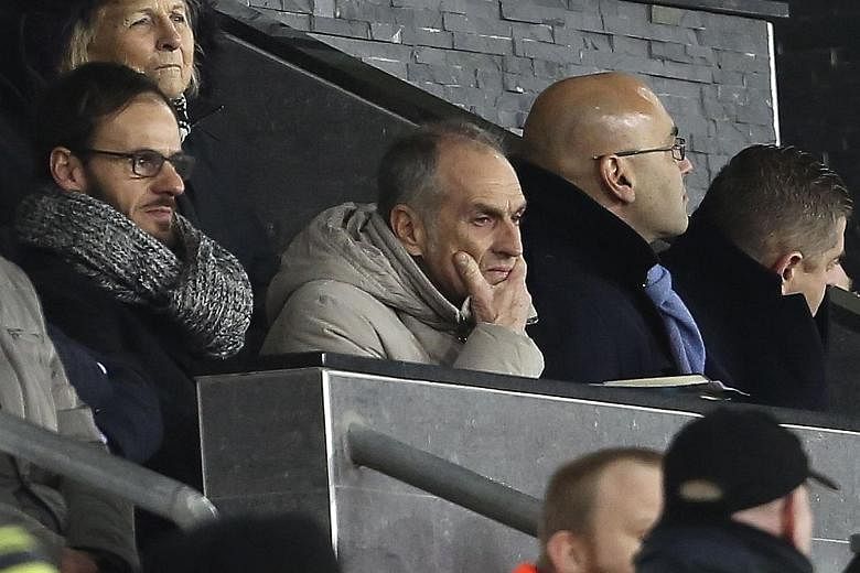New head coach Francesco Guidolin (centre) watching Swansea beat Watford on Monday. The 60-year-old will work alongside interim manager Alan Curtis, though the Italian will have the final say on team selection.