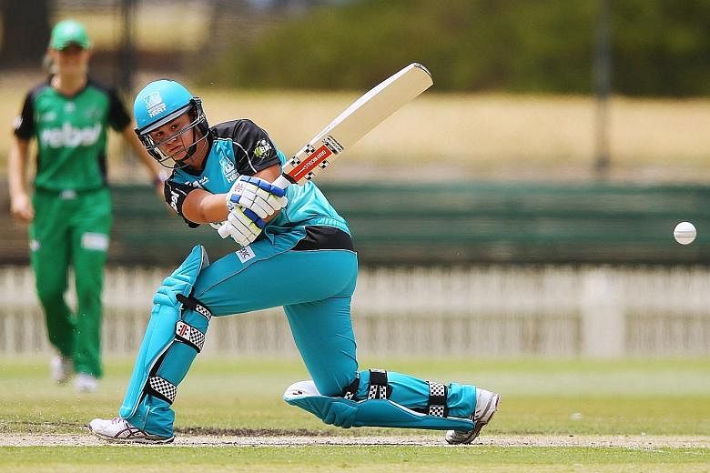 Australian Ash Barty in action for the Brisbane Heat in the Women's Big Bash League last month. The 19-year-old had earned more than US$900,000 in her brief tennis career but the maximum she can expect as a cricketer is about US$6,800.