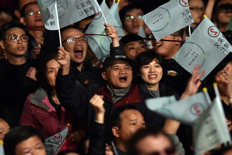 Ms Tsai's supporters cheering after her landslide win against the Kuomintang last weekend. A Tsai-led Taiwan is likely to persist with existing institutional mechanisms to pursue cross-strait relations with China, although the frequency or pace of ex