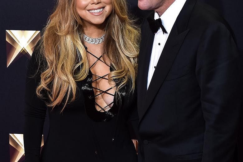 Australian billionaire James Packer had reportedly proposed to singer Mariah Carey (both left) with a 35-carat ring.