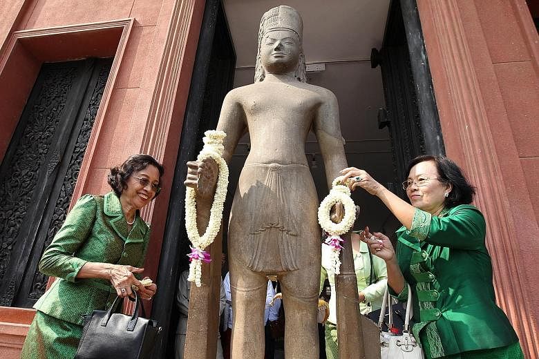 The restored Harihara statue was unveiled in a ceremony at the National Museum in Phnom Penh on Thursday, 130 years after the head of the historical artefact was taken to France from Cambodia.