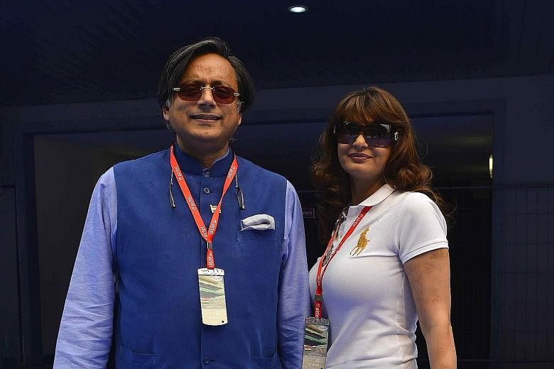 Former UN diplomat Shashi Tharoor and his wife Sunanda Pushkar in 2013. Ms Pushkar, who was found dead in a hotel in 2014, had accused Mr Tharoor of having an affair.