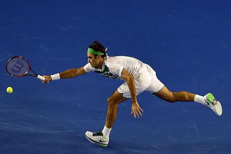 Roger Federer stretching for a forehand return to "Baby Fed" Grigor Dimitrov. While largely untroubled, the Swiss lost the second set and committed an uncharacteristically high 55 unforced efforts in the match.