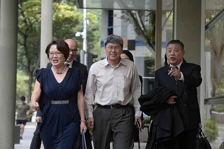 Workers' Party MPs Sylvia Lim and Png Eng Huat (centre) with lawyer Peter Low, who is representing Aljunied-Hougang Town Council, arriving at the Supreme Court yesterday. AHTC has said that it does not wish to make use of two of the Big Four accounti