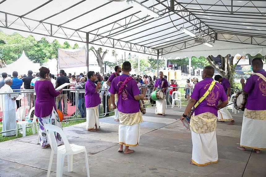 Musicians playing for the kavadi bearers at the live music stage at Dhoby Ghaut Green. For the first time in over 40 years, live music was available along the Thaipusam route withthree live music points,as well as seven transmission music points. Hin