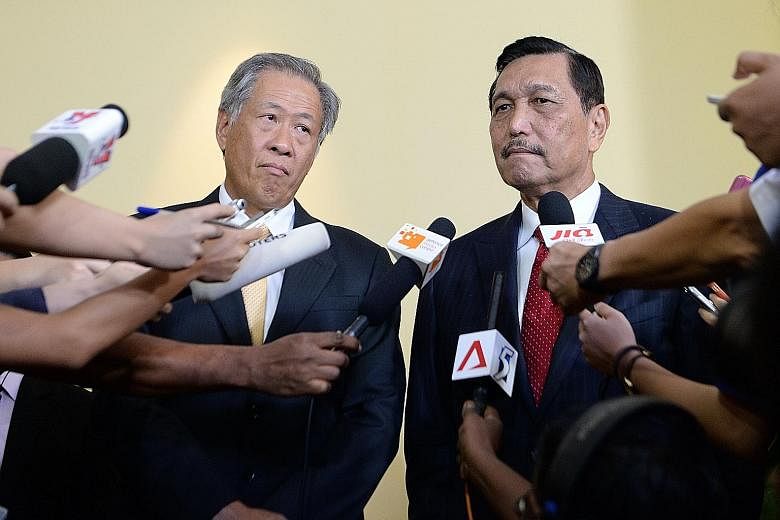 Defence Minister Ng Eng Hen (left) and Indonesia's Coordinating Minister for Political, Legal and Security Affairs Luhut Pandjaitan at the Fullerton Forum: The Shangri-La Dialogue Sherpa Meeting. Countries must work together as no nation is immune fr