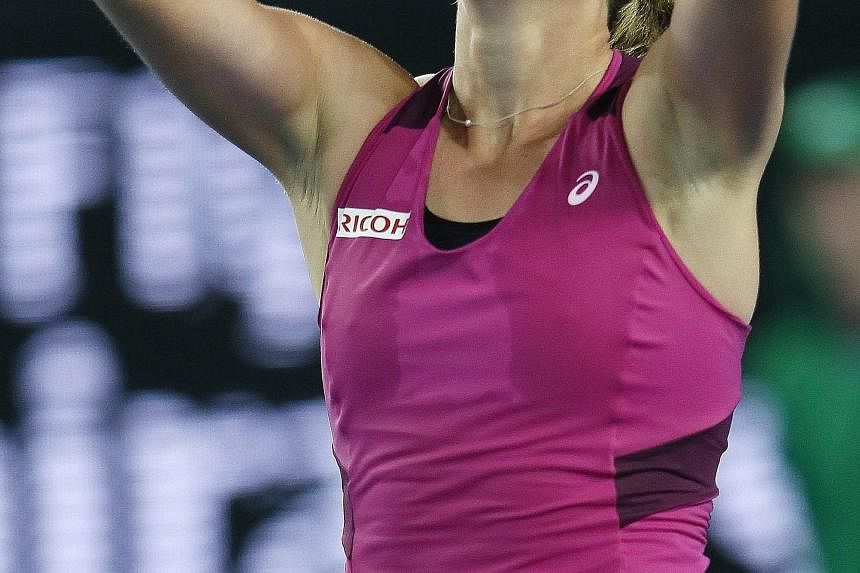 Britain's Johanna Konta after beating Ekaterina Makarova of Russia 4-6, 6-4, 8-6 at the Australian Open yesterday.