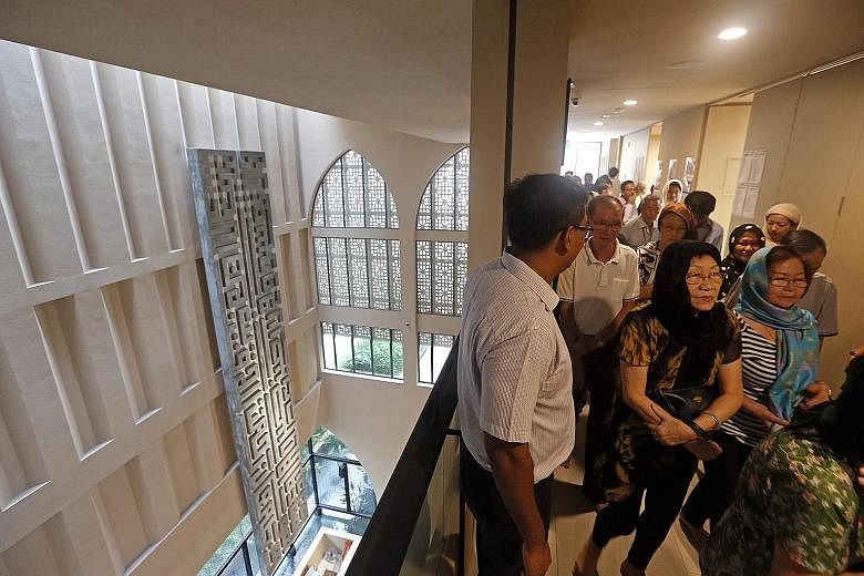 People ona guided tour in Al-Islah Mosque for residents of all races and religions last Saturday.Dr Maliki saysif there is an abrupt end to social harmony in Singapore, everyone will suffer. Every group needs to make the effort to understand the othe