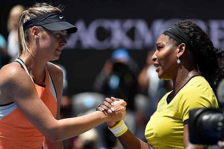 Serena Williams (right) shaking hands with Maria Sharapova after winning their Australian Open quarter-final 6-4, 6-1 yesterday.