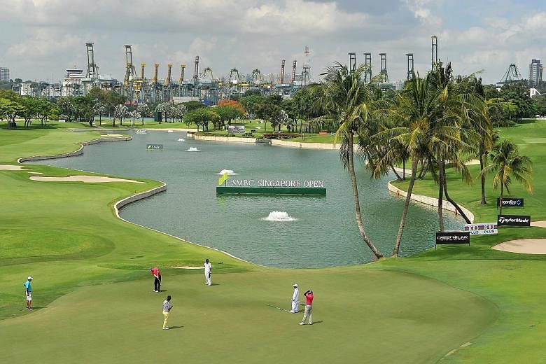 Golfers at the 18th hole of the Serapong Course yesterday. Former British Open champion and Europe's Ryder Cup captain Darren Clarke pointed out that each of the course's 18 holes presents a unique challenge.