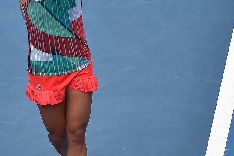 Angelique Kerber celebrating her 6-3, 7-5 win against Victoria Azarenka (not in picture) in the Australian Open quarter-finals.