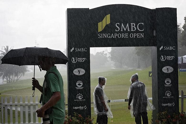 Heavy rain at the Sentosa Golf Club's Serapong Course yesterday forced play to be stopped and the Singapore Open final round to be extended to today.