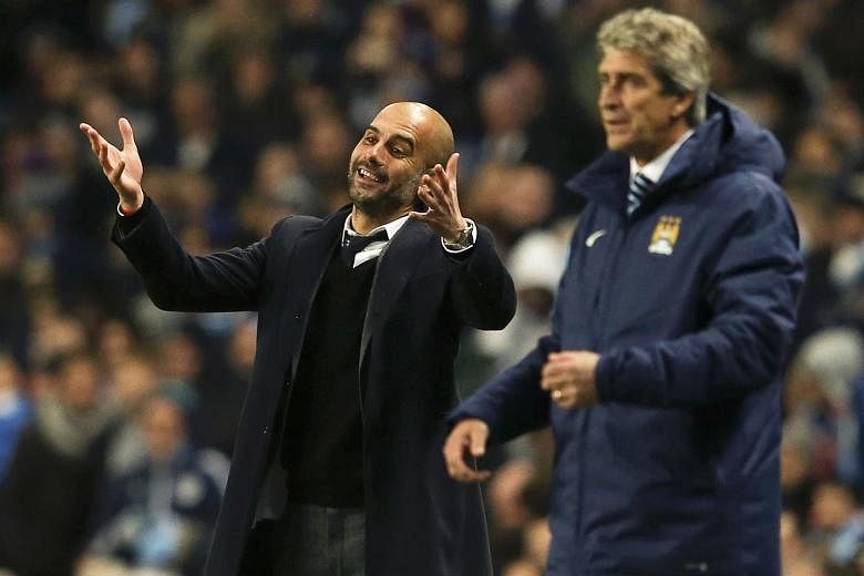 Bayern Munich coach Pep Guardiola (left) with Manchester City manager Manuel Pellegrini during a Champions League match in 2014. 