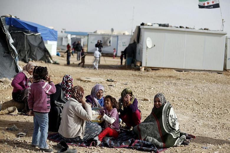 Syrian women at the Al Zaatri refugee camp in the Jordanian city of Mafraq on Jan 18.