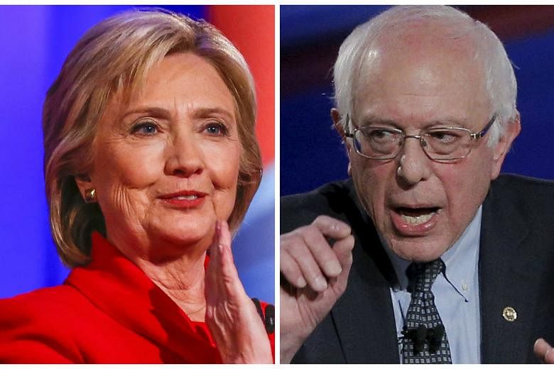 Mrs Clinton (left) took 49.8 per cent of the vote, against 49.6 per cent for Mr Bernie Sanders.