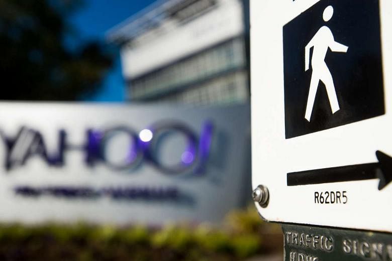 A pedestrian street crossing sign at Yahoo! headquarters in Sunnyvale, California.