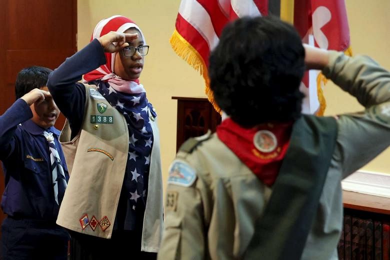 Scouts say the Pledge of Allegiance to the US flag prior to remarks by President Obama at the Islamic Society of Baltimore mosque on Wednesday.